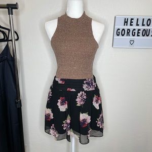 Black floral mini skirt